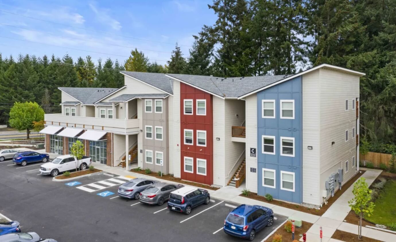 apartment building and parking lot